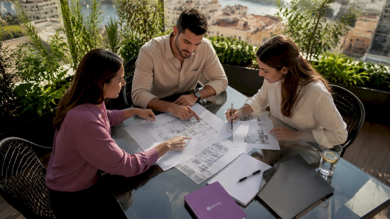 Team planning office layout in Malta coworking space