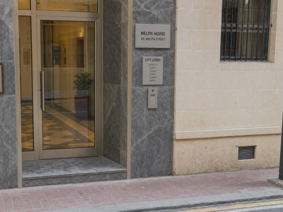 A Malta office entrance with intercom, parking meter and pavement access for evaluating location.